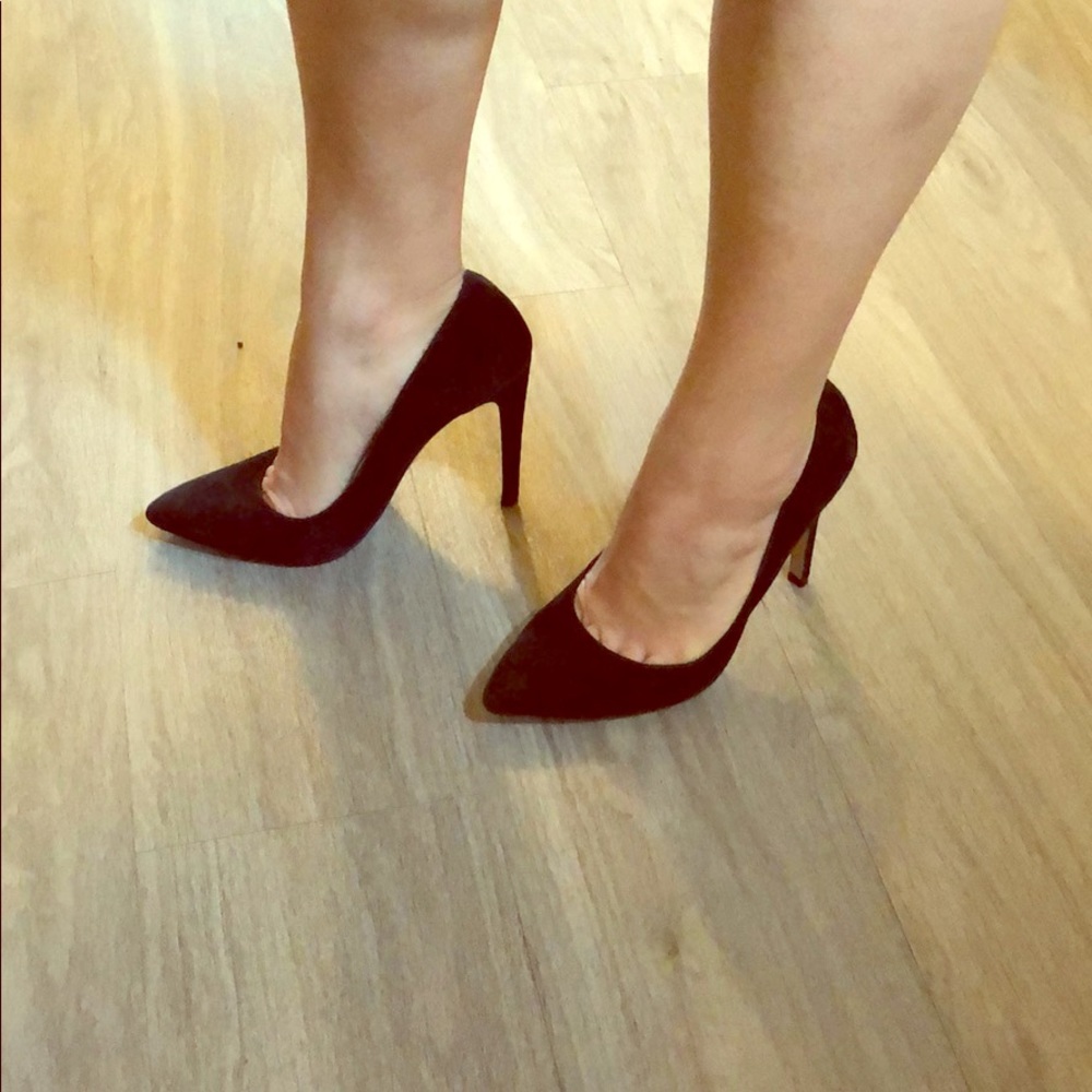 Lightly worn black suede pumps